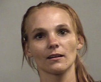 Louisville woman arrested after naked child found wandering acro