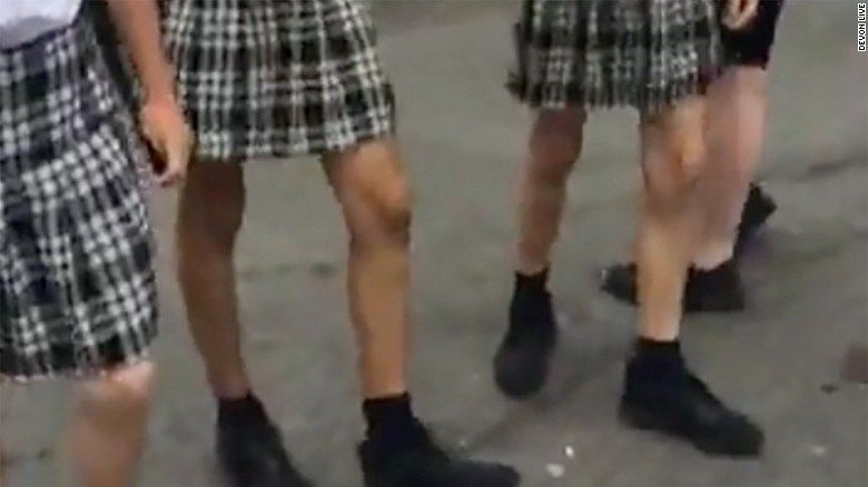 Boys win protest over school uniform