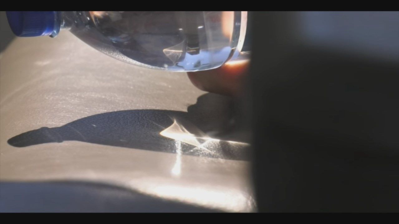 Sparked by extreme heat, bottle of water causes fire inside car WDRB