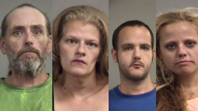 Louisville police arrest four after child allegedly found in car with